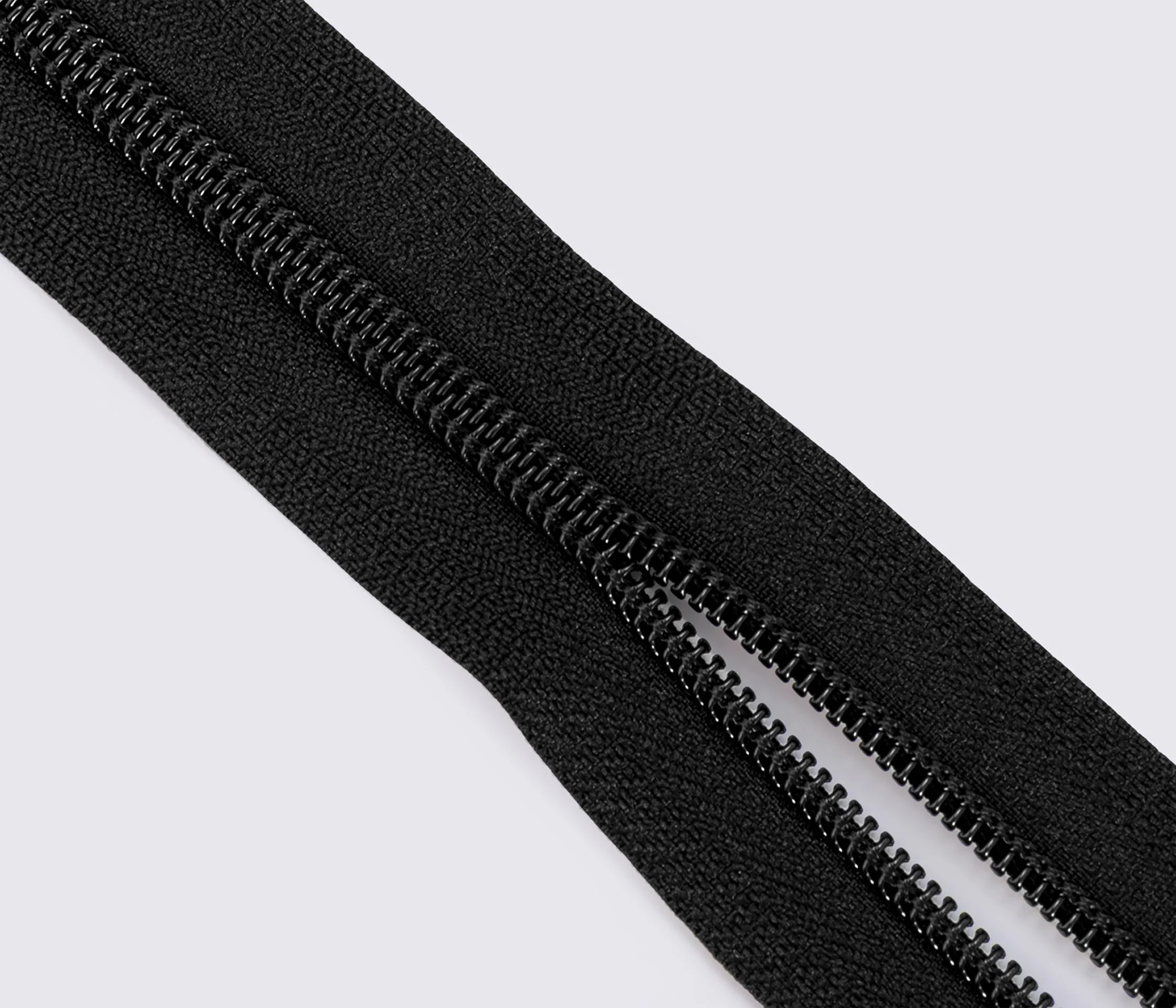 Молния спиральная для одежды YKK CI тип 5, цв. черный